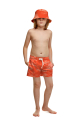 Kids swim shorts with "Savage Sunset" print